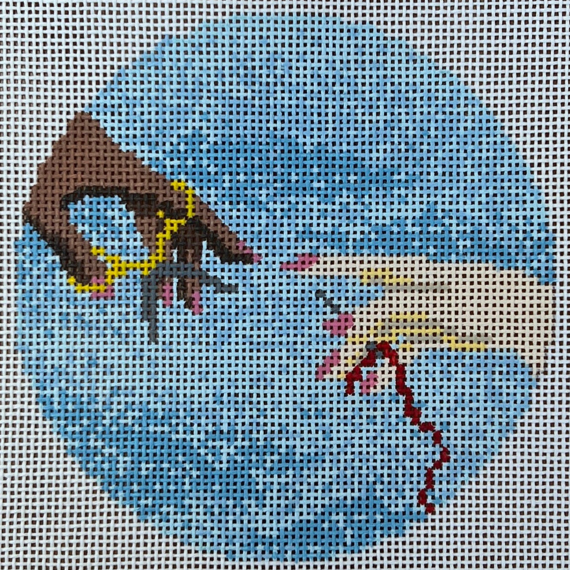 Creation of a Needlepointer Round