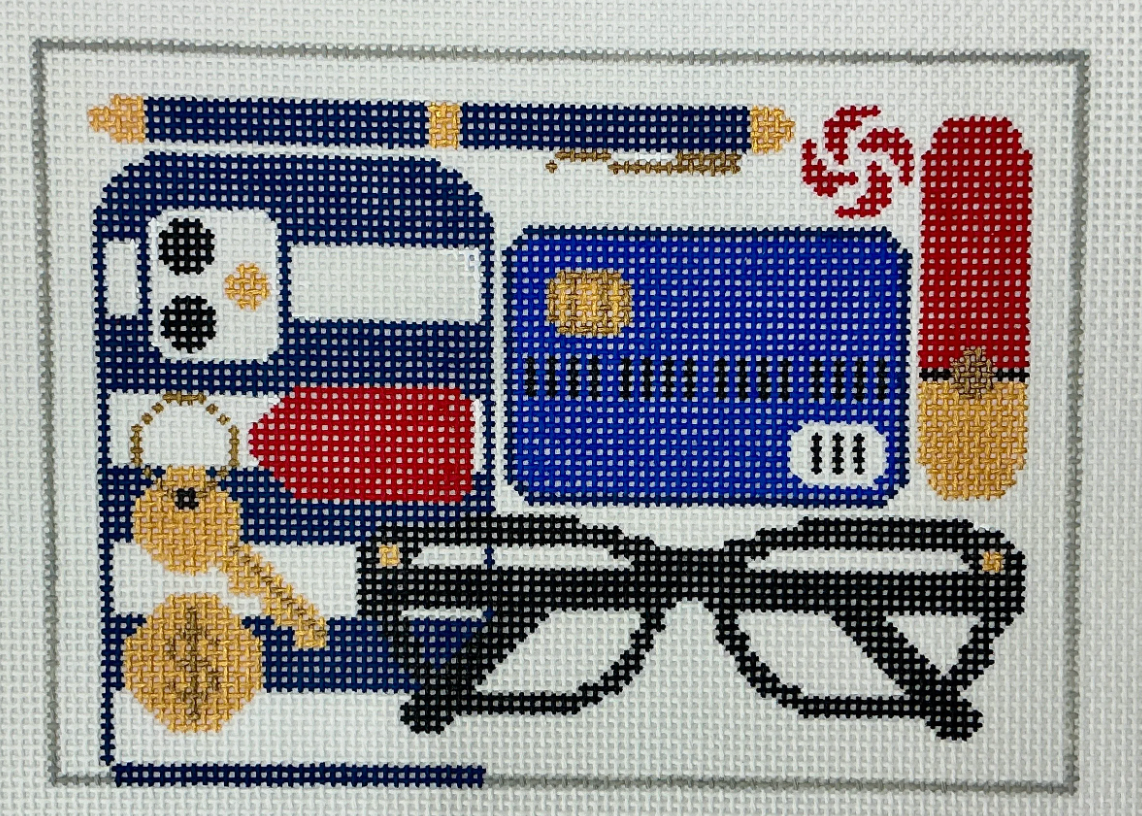 rachel donley clutch contents blue needlepoint canvas