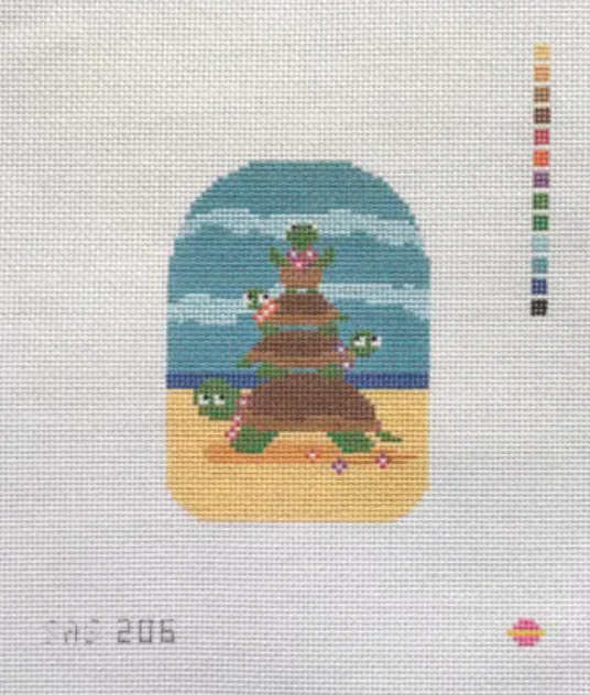 needlepoint design of a tortoise with flowers on a shell, framed by a blue sky and clouds.