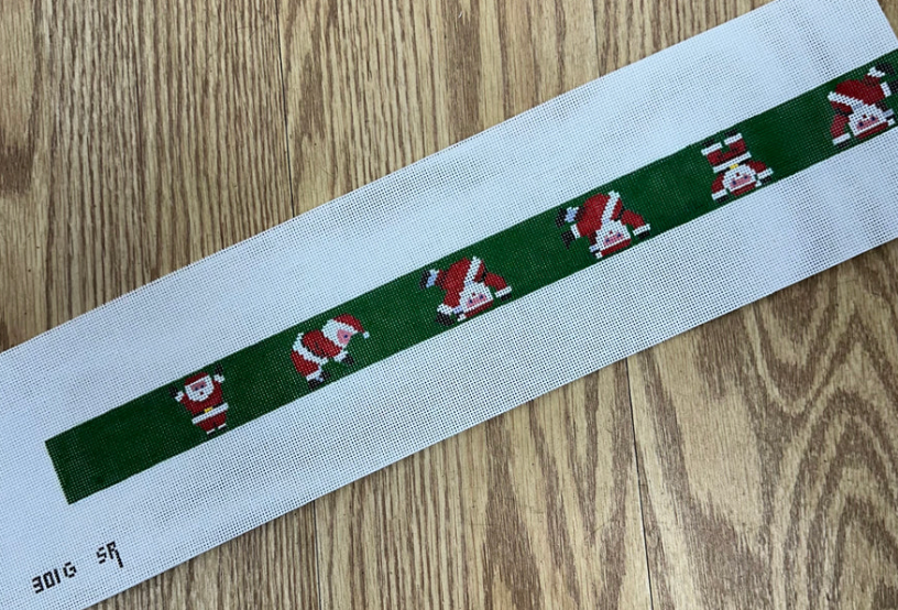 susan roberts tumbling santas green belt background belt needlepoint canvas