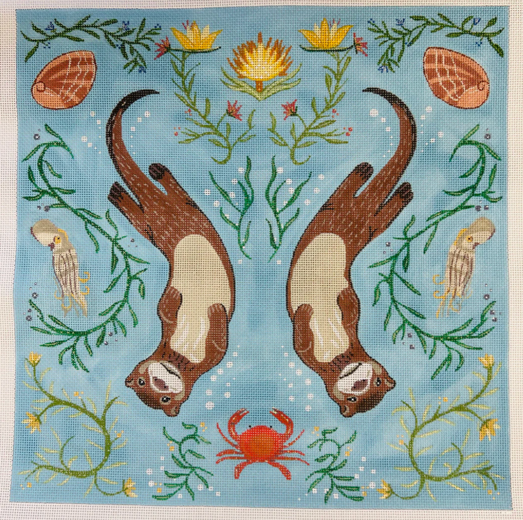 the collection otters with botanicals pillow needlepoint canvas