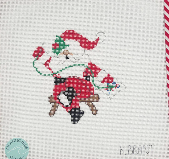 Needlepointing Santa