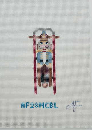 Sled with Blue Nutcracker Needlepoint Canvas - 14 mesh