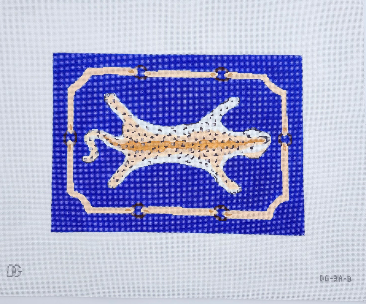 plum stitchery Leopard Clutch or Pillow on Blue needlepoint canvas